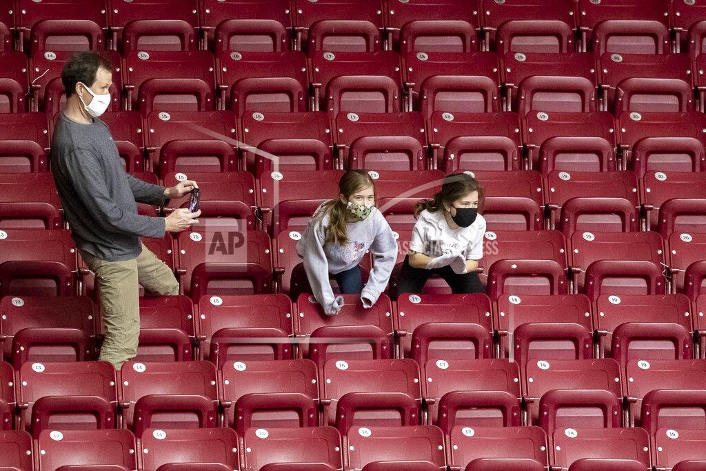 Vasha Hunt Alabama fans cheer against a Western Kentucky free-throw during the second half of an NCAA college basketball game, Saturday, Dec. 19, 2020, in Tuscaloosa, Ala. (AP Photo/Vasha Hunt)