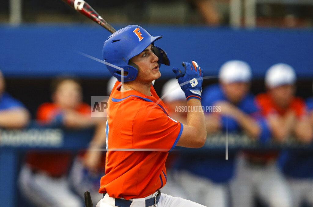 Gary Mccullough FILE - Florida outfielder Jud Fabian bats during an NCAA college baseball game against Florida A&M in Gainesville, Fla., in this Wednesday, March 4, 2020, file photo. The Gators are in a familiar place as the consensus No. 1 team in the preseason. Fabian might be the best position player in the country. (AP Photo/Gary McCullough, File)