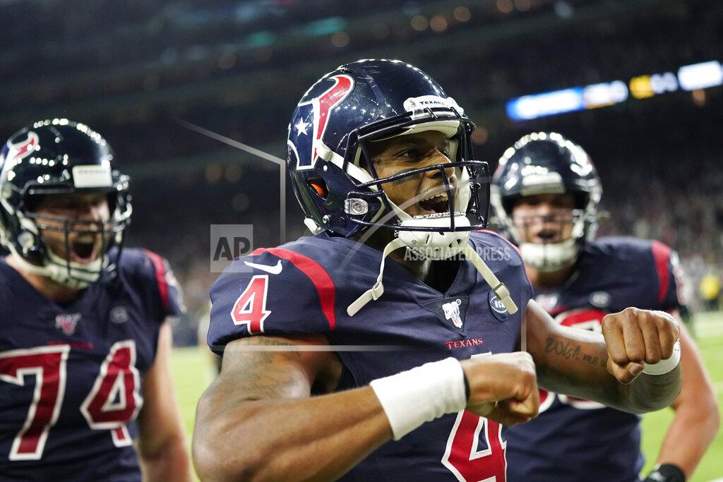 David J. Phillip Houston Texans quarterback Deshaun Watson (4) celebrates after he scored a touchdown against the New England Patriots during the second half of an NFL football game Sunday, Dec. 1, 2019, in Houston. (AP Photo/David J. Phillip)