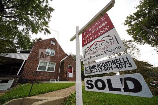 This is a home sold in Mount Lebanon, Pa., on Tuesday, Sept. 21, 2021. Average long-term mortgage rates rose slightly this week continuing a months-long trend of little movement. They remained under 3%. Mortgage buyer Freddie Mac reports that the average rate for a 30-year mortgage edged up to 2.88% from 2.86% last week. (AP Photo/Gene J. Puskar)