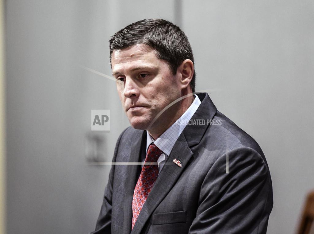 Bruce Newman Mississippi athletic director Keith Carter listens while discussing the future of the football program during a news conference at the Manning Center, in Oxford, Miss. on Monday, Dec. 2, 2019. Mississippi fired football coach Matt Luke on Sunday, three days after his third non-winning season ended with an excruciating rivalry game loss. (Bruce Newman/The Oxford Eagle via AP)