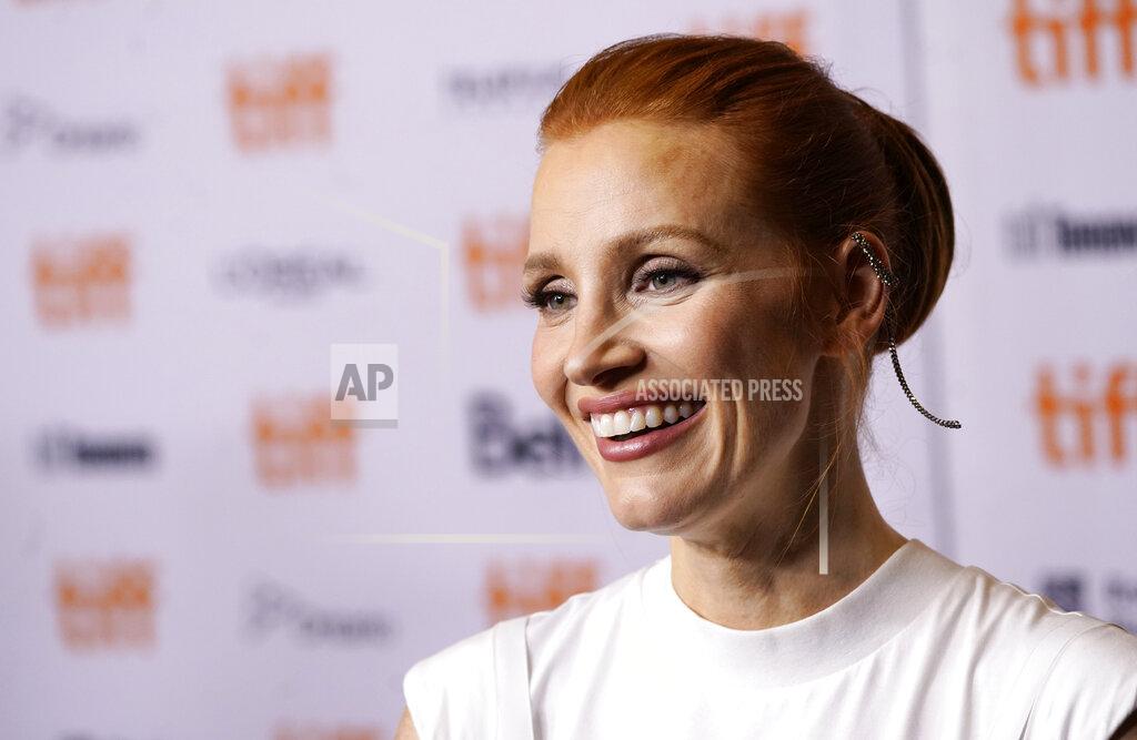 Chris Pizzello Jessica Chastain, a cast member in "The Eyes of Tammy Faye," smiles at the premiere of the film at the 2021 Toronto International Film Festival, Sunday, Sept. 12, 2021, in Toronto. (AP Photo/Chris Pizzello)