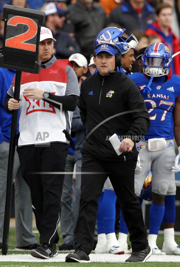 Orlin Wagner Kansas head coach David Beaty works the side lines during the first half of an NCAA college football game against Texas in Lawrence, Kan., Friday, Nov. 23, 2018. (AP Photo/Orlin Wagner)