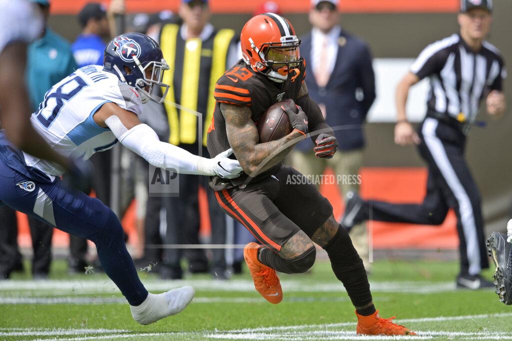 David Richard Cleveland Browns wide receiver Odell Beckham Jr., right, rushes during the first half in an NFL football game against the Tennessee Titans, Sunday, Sept. 8, 2019, in Cleveland. (AP Photo/David Richard)