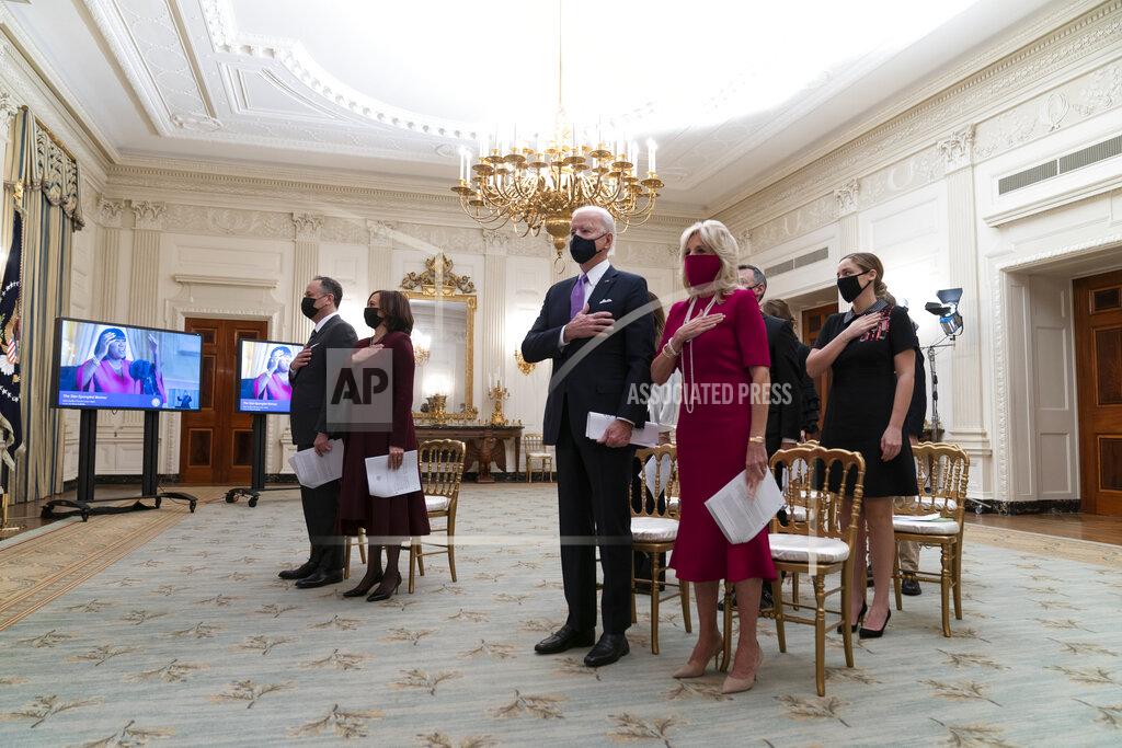 Alex Brandon FILE - In this Thursday, Jan. 21, 2021 file photo, Doug Emhoff, left, Vice President Kamala Harris, President Joe Biden, and first lady Jill Biden, stand during a performance of the national anthem during a virtual Presidential Inaugural Prayer Service, in the State Dinning Room of the White House, in Washington. Donald Trump's departure from the White House and the start of Biden’s presidency have stirred new hopes among many religious leaders in the United States, while causing dismay among others. For leaders of the two largest Christian denominations — the Roman Catholic Church and the Southern Baptist Convention — the paramount concern about the Biden administration is its strong support for abortion rights. (AP Photo/Alex Brandon, File)