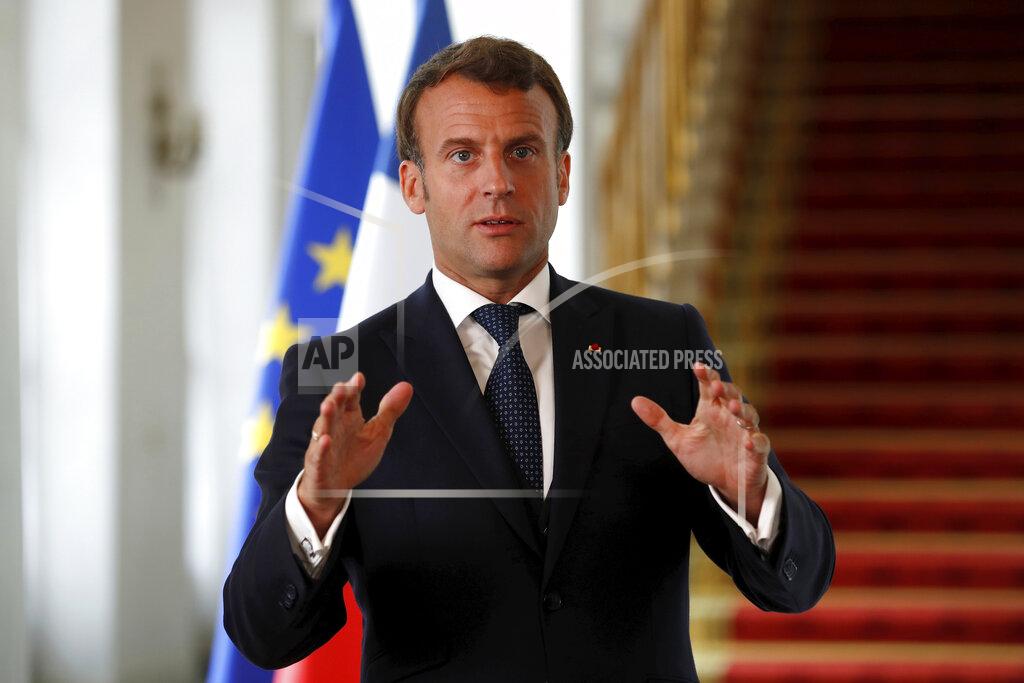 Gonzalo Fuentes French President Emmanuel Macron speaks after a video-conference summit on vaccination at the Elysee Palace in Paris, Monday, May 4, 2020. World leaders began pledging Monday hundreds of millions of dollars to fund research into a vaccine against the new coronavirus, but warned that it is just the start of an effort that must be sustained over time to beat the disease. (Gonzalo Fuentes/Pool via AP)
