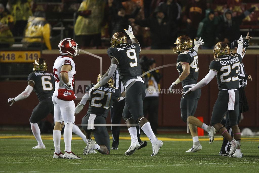 Stacy Bengs Minnesota's Esezi Otomewo (9) and teammates signal the possession of the ball after Indiana fumbled during an NCAA college football game Friday, Oct. 26, 2018, in Minneapolis. Minnesota won 38-31. (AP Photo/Stacy Bengs)