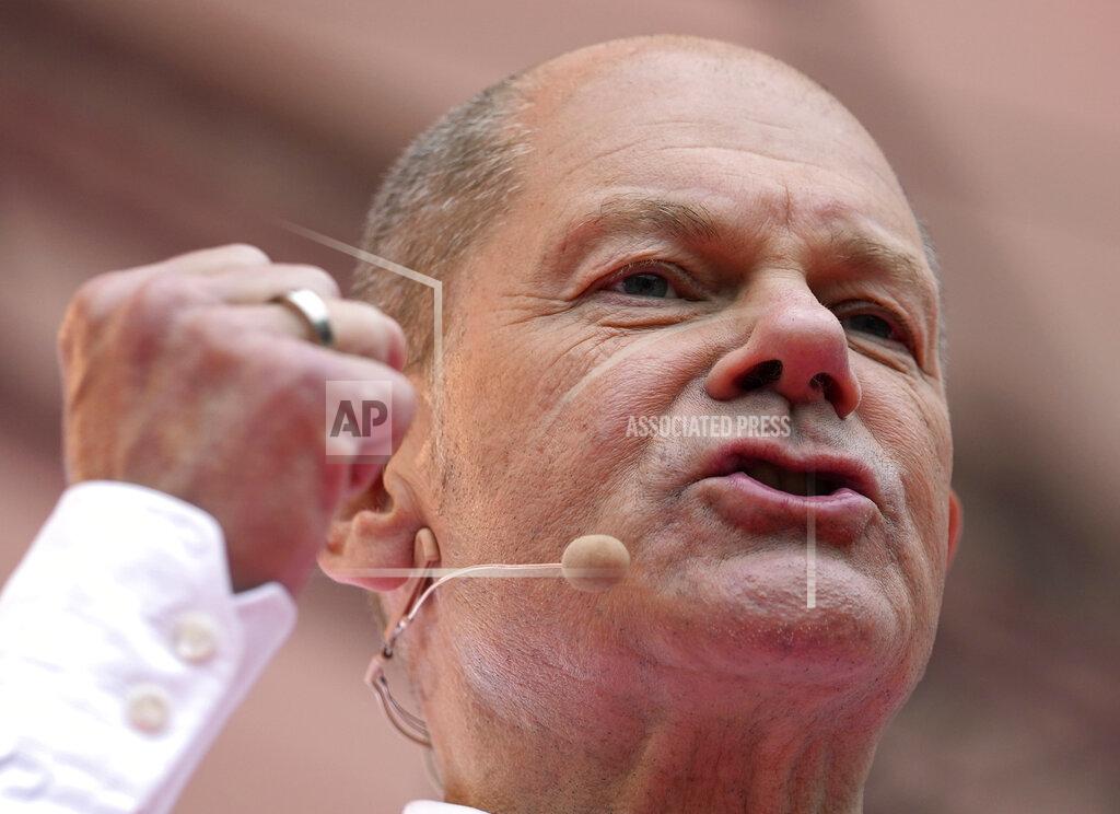 Martin Meissner Olaf Scholz, German Finance Minister and top candidate for Chancellor, speaks at the final election campaign event of the Social Democratic Party, SPD, in Cologne, Germany, Friday, Sept. 24, 2021. The German elections will take place next Sunday, Sept. 26. (AP Photo/Martin Meissner, POOL)