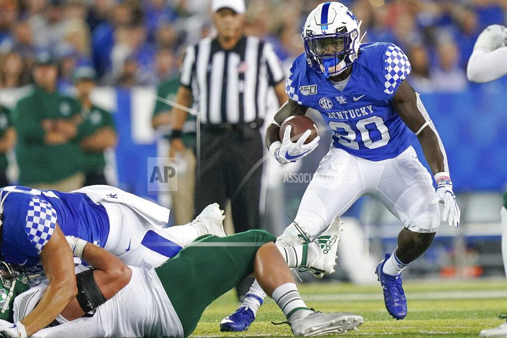 Bryan Woolston Kentucky running back Kavosiey Smoke (20) runs with the ball during the first half of an NCAA college football game between Kentucky and Eastern Michigan, Saturday, Sept. 7, 2019, in Lexington, Ky. (AP Photo/Bryan Woolston)