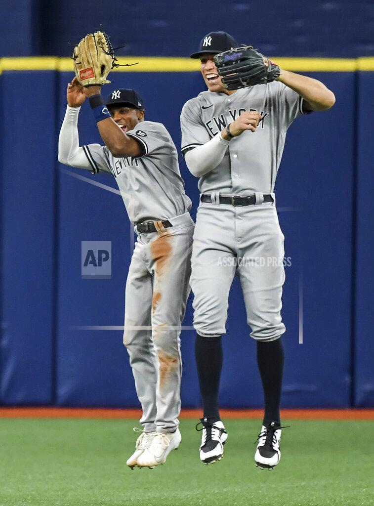 Steve Nesius New York Yankees outfielders Greg Allen, left, and Aaron Judge celebrate the team's 4-3 win over the Tampa Bay Rays in a baseball game Tuesday, July 27, 2021, in St. Petersburg, Fla. (AP Photo/Steve Nesius)