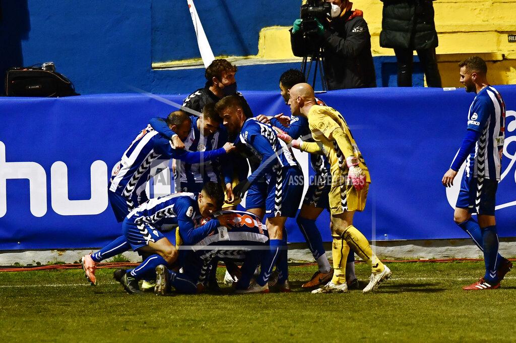 Jose Breton Alcoyano players celebrates after Juanan scored his side's second goal during a Spanish Copa del Rey round of 32 soccer match between Alcoyano and Real Madrid at the El Collao stadium in Alcoy, Spain, Wednesday Jan. 20, 2021. (AP Photo/Jose Breton)