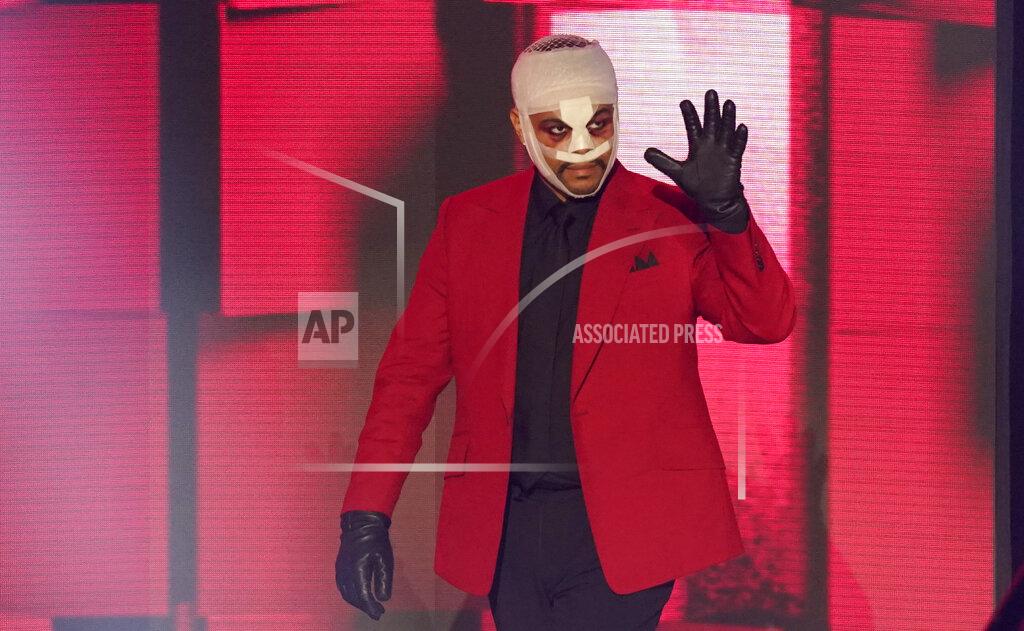 Chris Pizzello The Weeknd appears on stage to accept the award for favorite male soul/R&B artist at the American Music Awards on Sunday, Nov. 22, 2020, at the Microsoft Theater in Los Angeles. (AP Photo/Chris Pizzello)
