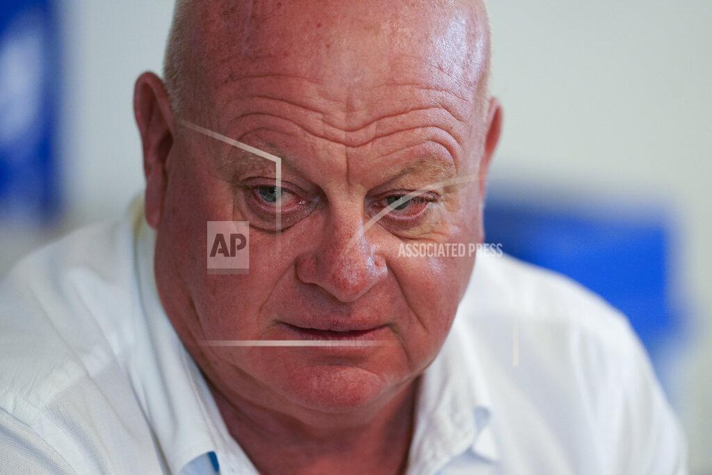 Darron Cummings Wayne McLaughlin speaks about seeing his son Scott McLaughlin, of New Zealand, before qualifications for the Indianapolis 500 auto race at Indianapolis Motor Speedway, Sunday, May 22, 2022, in Indianapolis. After 31 months apart, his family has finally been able to travel outside New Zealand and hopped a plane to watch their son race the Indianapolis 500. (AP Photo/Darron Cummings)
