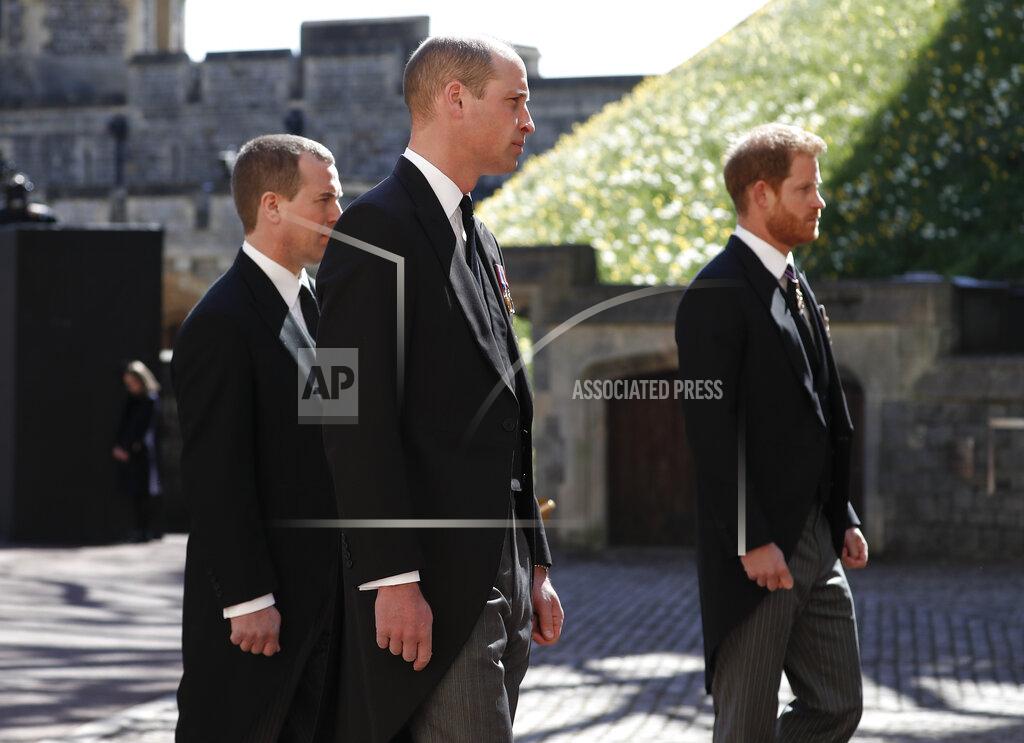 Alastair Grant Britain's Prince Harry, right, Prince William, Peter Phillips, left, follow the coffin in a ceremonial procession for the funeral of Britain's Prince Philip inside Windsor Castle in Windsor, England Saturday April 17, 2021. Prince Philip died April 9 at the age of 99 after 73 years of marriage to Britain's Queen Elizabeth II. (Alastair Grant/Pool via AP)