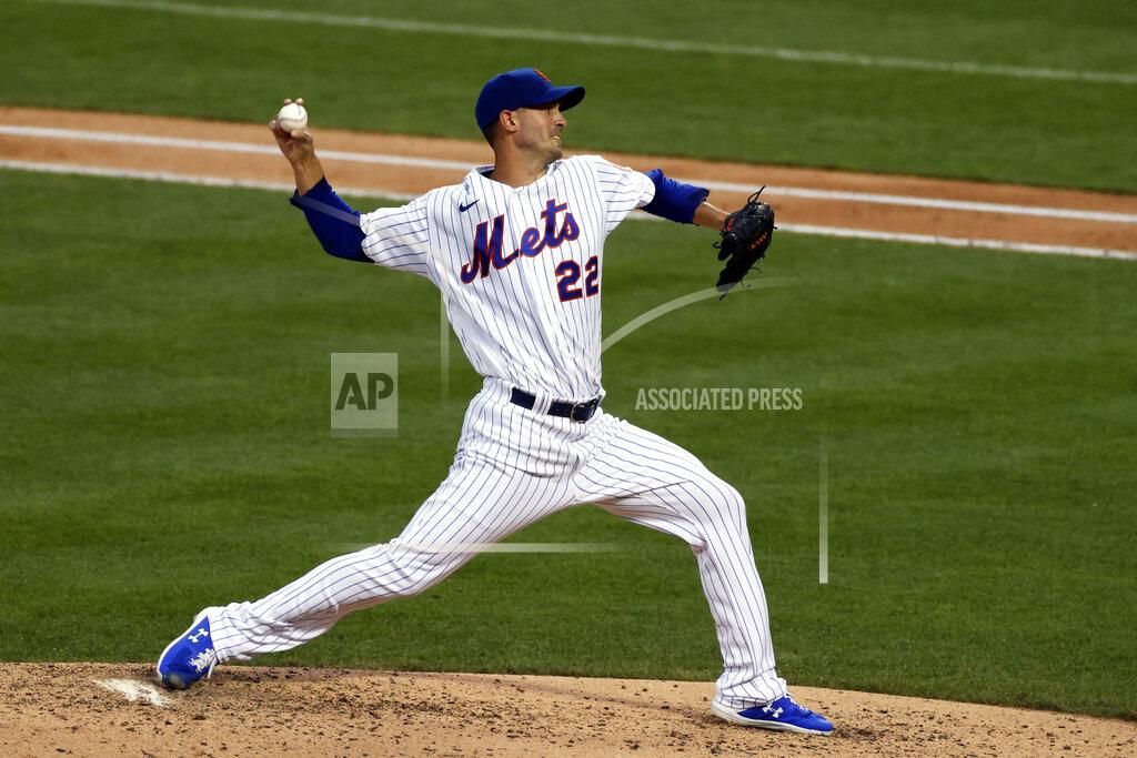 Adam Hunger New York Mets pitcher Rick Porcello throws to an Atlanta Braves batter during the third inning of a baseball game Sunday, July 26, 2020, in New York. (AP Photo/Adam Hunger)