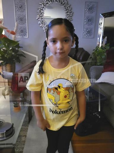 In this photo provided by Desiree Myles, 5-year-old Zoey Felix poses for a photo after neighbors bought her a new outfit and cleaned her up in September 2023. A homeless man was charged Thursday, Oct. 5, 2023, in the rape and killing of Felix, who died Monday, Oct. 2, despite firefighters' efforts to save her life in a gas station parking lot in Topeka. (Desiree Myles via AP)