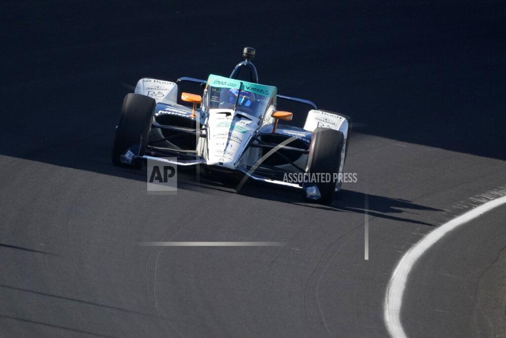 Darron Cummings Fernando Alonso, of Spain, drives into turn one during a practice session for the Indianapolis 500 auto race at Indianapolis Motor Speedway, Sunday, Aug. 16, 2020, in Indianapolis. (AP Photo/Darron Cummings)