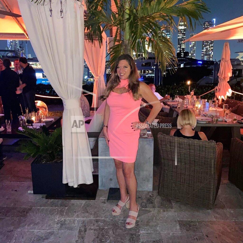 Uncredited This April 17, 2021 photo provided by Liz Segel shows Estelle Hedaya at The Deck at Island Gardens in Miami. Ikey Hedaya is still waiting for closure almost a month after the Surfside condo collapse. He has given his DNA, talks frequently with the medical examiner and even reluctantly visited the collapse site to see for himself what is being done to find his big sister. Fifty-four-year-old Estelle Hedaya appears to be the only missing victim yet to be identified after the June 24 collapse. (Liz Segel via AP)