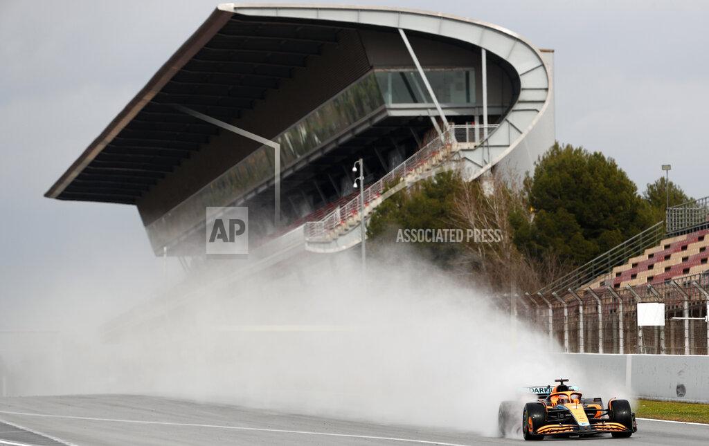 Joan Monfort Mclaren driver Daniel Ricciardo of Australia steers his car during a Formula One pre-season testing session at the Catalunya racetrack in Montmelo, just outside of Barcelona, Spain, Friday, Feb. 25, 2022. (AP Photo/Joan Monfort)