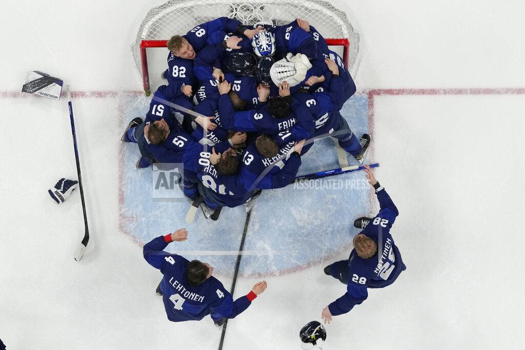 Petr David Josek Finland celebrates defeating the Russian Olympic Committee in the men's gold medal hockey game at the 2022 Winter Olympics, Sunday, Feb. 20, 2022, in Beijing. (AP Photo/Petr David Josek)