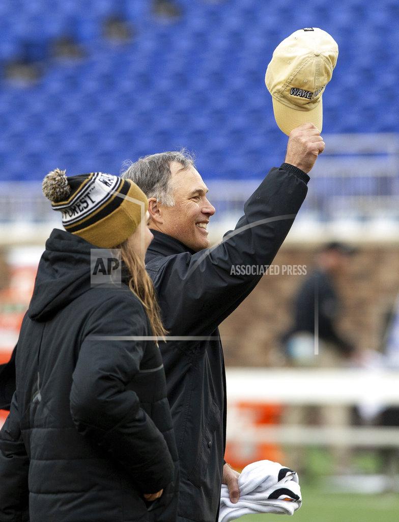 Ben Mckeown Wake Forest head coach Dave Clawson waves to fans following a victory over Duke in an NCAA college football game in Durham, N.C., Saturday, Nov. 24, 2018. (AP Photo/Ben McKeown)