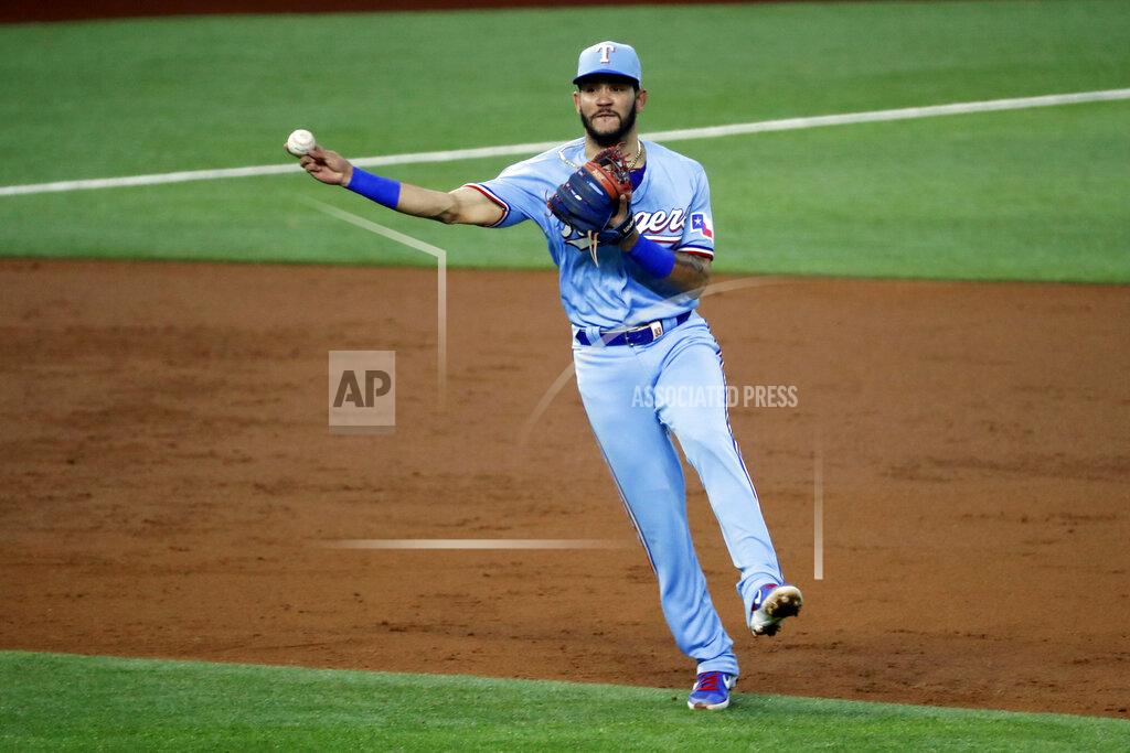 Roger Steinman Texas Rangers shortstop Anderson Tejeda throws to first during the third inning of a baseball game against the Houston Astros in Arlington, Texas, Sunday, Sept. 27, 2020. (AP Photo/Roger Steinman)