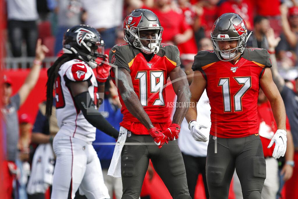 Mark Lomoglio Tampa Bay Buccaneers wide receiver Breshad Perriman (19) celebrates with wide receiver Justin Watson (17) after Perriman caught a 24-yard touchdown reception against the Atlanta Falcons during the first half of an NFL football game Sunday, Dec. 29, 2019, in Tampa, Fla. (AP Photo/Mark LoMoglio)