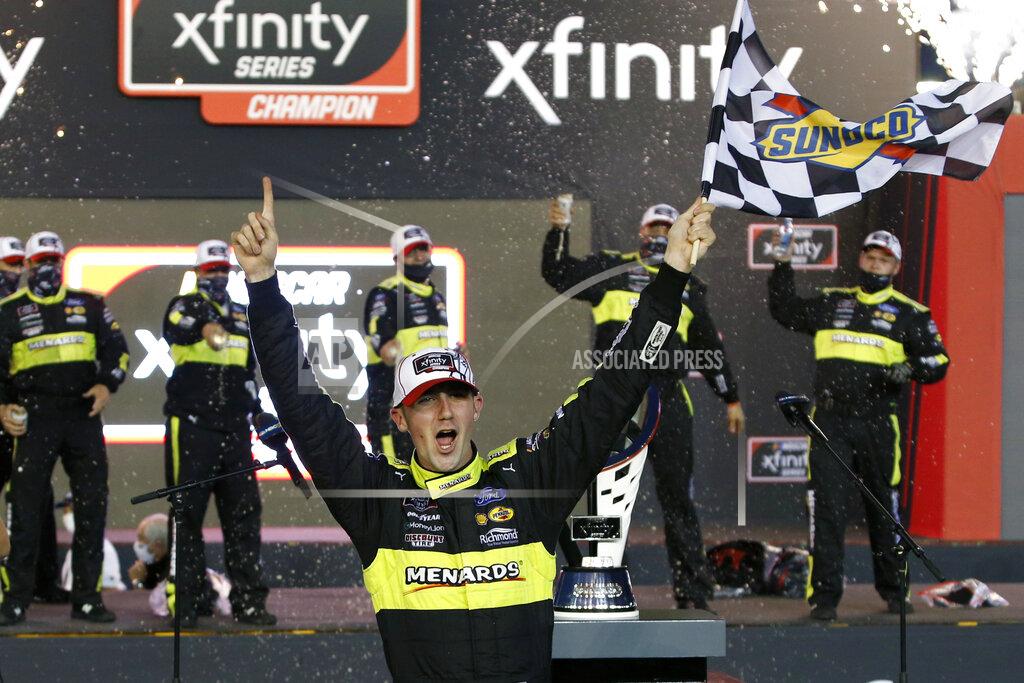 Ralph Freso Austin Cindric celebrates in Victory Lane after winning the season championship and a NASCAR Xfinity Series auto race at Phoenix Raceway, Saturday, Nov. 7, 2020, in Avondale, Ariz. (AP Photo/Ralph Freso)