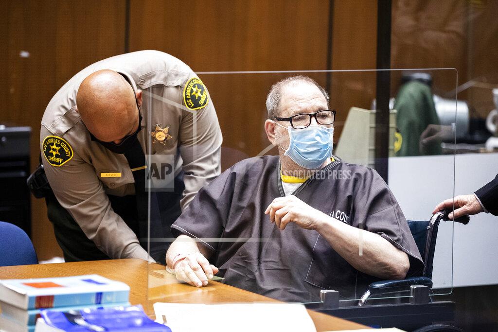 Etienne Laurent Harvey Weinstein, the 69-year-old convicted rapist and disgraced movie mogul, wears a face mask behind a protective plexiglass screen, as he listens in court during a pre-trial hearing in Los Angeles, Thursday, 29 July 2021. Weinstein pleaded not guilty Wednesday to four counts of rape and seven other sexual assault counts in California.(Etienne Laurent/Pool Photo via AP)