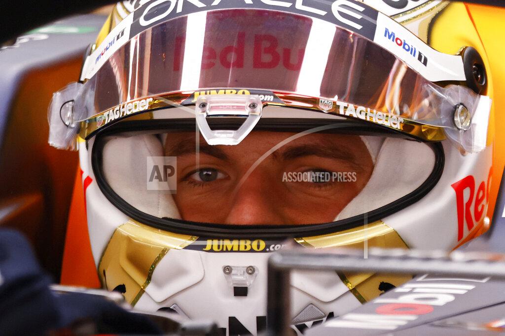 Red Bull driver Max Verstappen of the Netherlands sits in his car during a Formula One pre-season testing session at the Catalunya racetrack in Montmelo, just outside of Barcelona, Spain, Wednesday, Feb. 23, 2022. (AP Photo/Joan Monfort)