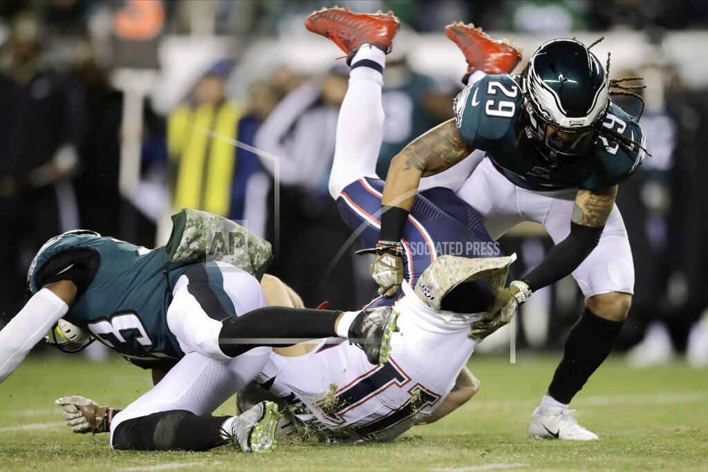 Matt Rourke New England Patriots' Julian Edelman (11) is tackled by Philadelphia Eagles' Rodney McLeod (23) and Avonte Maddox (29) during the first half of an NFL football game, Sunday, Nov. 17, 2019, in Philadelphia. (AP Photo/Matt Rourke)