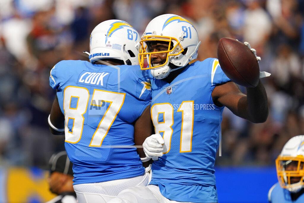 Gregory Bull Los Angeles Chargers wide receiver Mike Williams (81) celebrates his touchdown catch with tight end Jared Cook (87) during the second half of an NFL football game against the Cleveland Browns Sunday, Oct. 10, 2021, in Inglewood, Calif. (AP Photo/Gregory Bull)