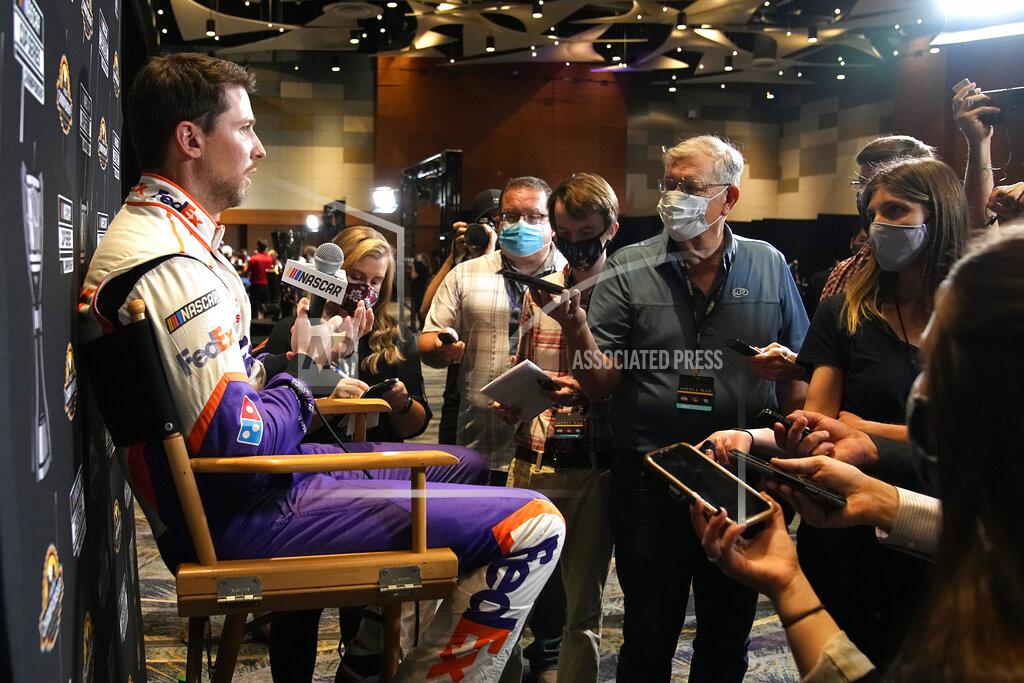Rick Scuteri Driver Denny Hamlin speaks during media day ahead of Sunday's NASCAR Cup Series championship auto race on Thursday, Nov. 4, 2021, in Phoenix. (AP Photo/Rick Scuteri)