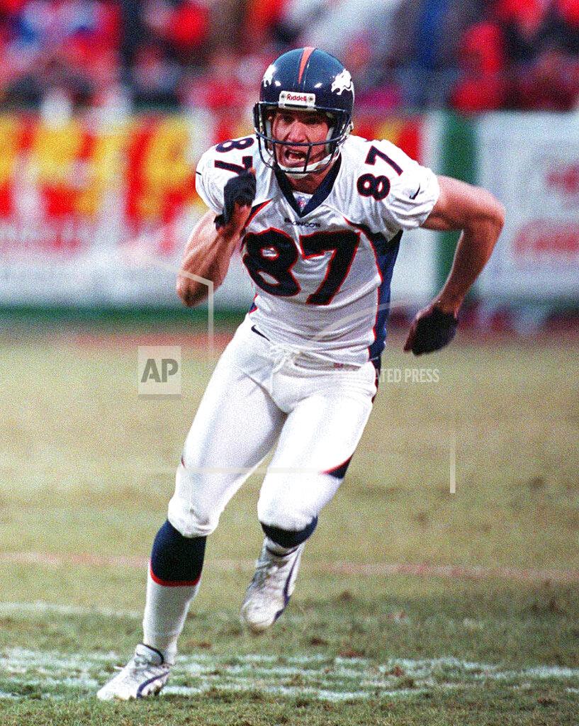 Ron Heflin FILE - In this Jan. 4, 1998, file photo, Denver Broncos wide receiver Ed McCaffrey runs a pass route during and AFC Divisional playoff NFL football game against the Kansas City Chiefs in Kansas City. Luke McCaffrey, the younger brother of the Carolina Panthers star Christian McCaffrey and son of former NFL receiver Ed McCaffrey, made an unexpected entrance for Nebraska against Indiana last week and turned in a strong performance. (AP Photo/Ron Heflin, File)