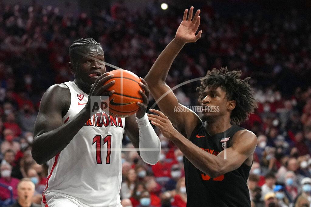 Rick Scuteri Arizona center Oumar Ballo (11) drives on Oregon State forward Glenn Taylor Jr. during the second half of an NCAA college basketball game Thursday, Feb. 17, 2022, in Tucson, Ariz. Arizona won 83-69. (AP Photo/Rick Scuteri)