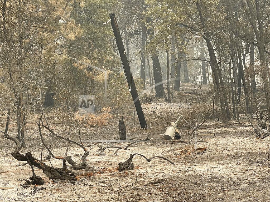 Elias Funez PG&E has completed their damage assessment of the River Fire and has begun repairing the damaged infrastructure, Aug. 7, 2021. (Elias Funez/The Union via AP)
