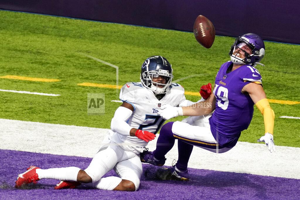 Jim Mone Tennessee Titans cornerback Malcolm Butler, left, breaks up a pass intended for Minnesota Vikings wide receiver Adam Thielen (19) in the end zone during the first half of an NFL football game, Sunday, Sept. 27, 2020, in Minneapolis. (AP Photo/Jim Mone)