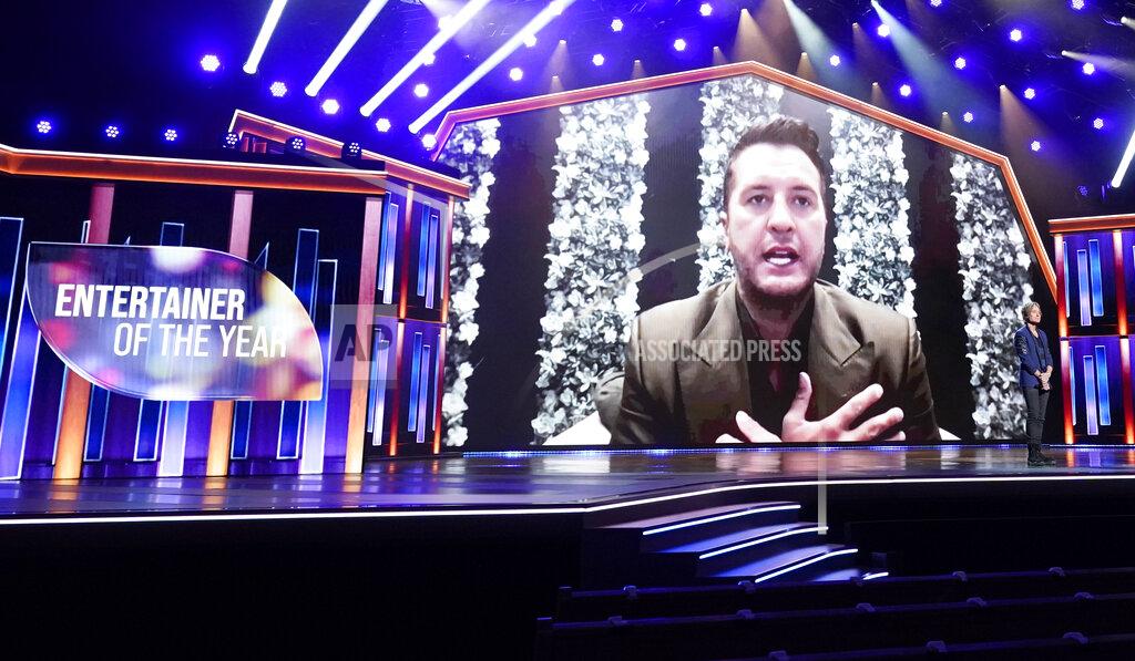 Mark Humphrey Luke Bryan appears on screen accepting the award for entertainer of the year at the 56th annual Academy of Country Music Awards on Sunday, April 18, 2021, at the Grand Ole Opry in Nashville, Tenn. (AP Photo/Mark Humphrey)