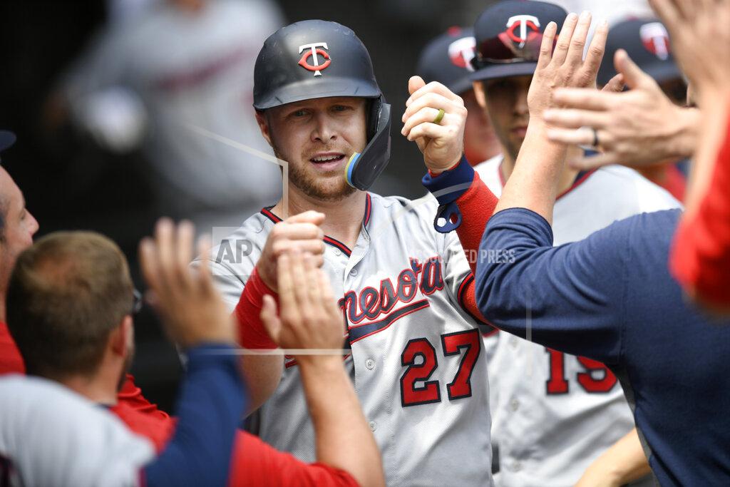 Paul Beaty Minnesota Twins' Ryan Jeffers (27) celebrates with teammates in the dugout after scoring on a Luis Arraez single during the second inning of a baseball game against the Chicago White Sox, Wednesday, July 6, 2022, in Chicago. (AP Photo/Paul Beaty)