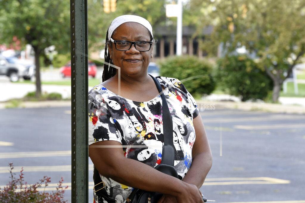 Jose Juarez Regina Howard poses for a photo in Southfield, Mich., Friday, July 30, 2021. Lakeshore Legal Aid successfully helped Howard receive $24,550 in federal funds to pay for 15 months of rent. (AP Photo/Jose Juarez)