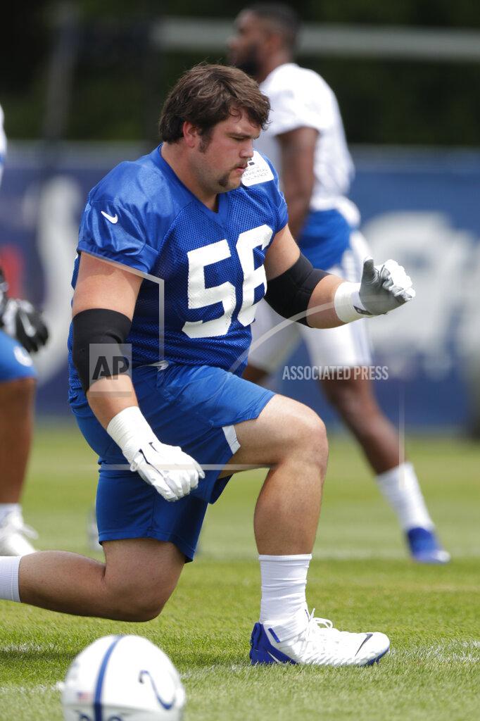 Michael Conroy Indianapolis Colts offensive guard Quenton Nelson (56) warms up during practice at the NFL team's football training camp in Westfield, Ind., Friday, July 26, 2019. (AP Photo/Michael Conroy)