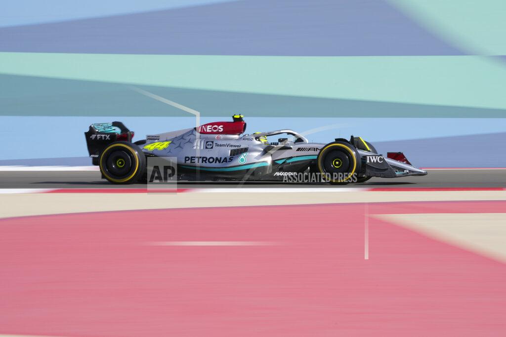 Hassan Ammar Mercedes driver Lewis Hamilton of Britainsteers his car during a practice for theFormula One Bahrain Grand Prix it in Sakhir, Bahrain, Friday, March 18, 2022. (AP Photo/Hassan Ammar)