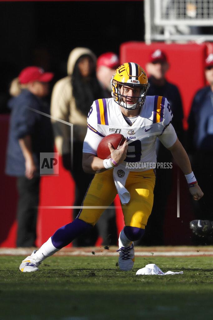 John Bazemore LSU quarterback Joe Burrow (9) scrambles in the first half of an NCAA college football game against Alabama, Saturday, Nov. 9, 2019, in Tuscaloosa, Ala. (AP Photo/John Bazemore)