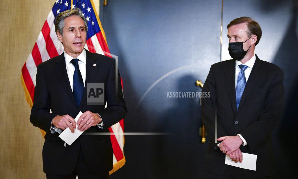Frederic J. Brown Secretary of State Antony Blinken, accompanied by National Security Adviser Jake Sullivan, right, talks to the media after a closed-door morning session of US-China talks in Anchorage, Alaska on Friday, March 19, 2021. (Frederic J. Brown/Pool via AP)