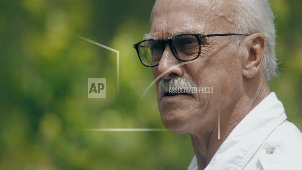 Uncredited In an image provided by ESPN from video, Rocky Bleier stands in Hiep Duc Valley, about 35 miles (56 kilometers) south of Danang in Vietnam, on Aug. 20, 2018. Three months into his deployment to Vietnam, Bleier was shot through the thigh and suffered a grenade blast to his foot. Doctors told him that he’d never play football again. Steelers owner Art Rooney supported Bleier by placing him on injured reserve rather than cutting him from the team. Bleier then defied the odds, returning to football as a star running back on the “Steel Curtain” Steelers teams of the 1970s and becoming the only war veteran to have four Super Bowl rings. (ESPN via AP)