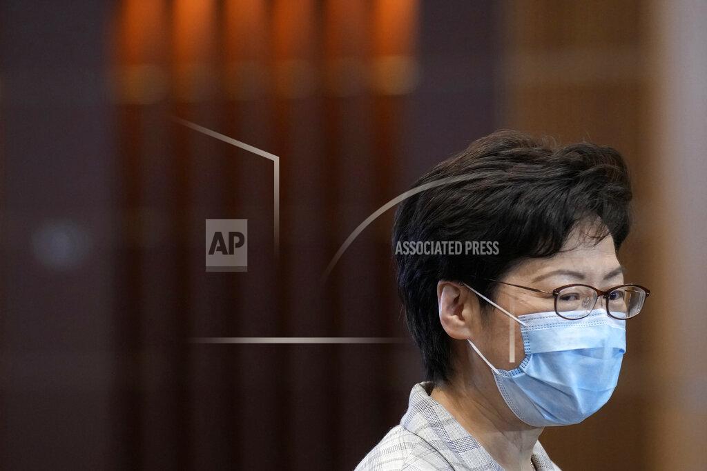 Vincent Yu Hong Kong Chief Executive Carrie Lam speaks during a press conference at a polling center for the election committee that will vote for the city's leader in Hong Kong Sunday, Sept. 19, 2021. Hong Kong's polls for an election committee that will vote for the city's leader kicked off Sunday amid heavy police presence, with chief executive Carrie Lam saying that it is "very meaningful" as it is the first election to take place following electoral reforms. (AP Photo/Vincent Yu)