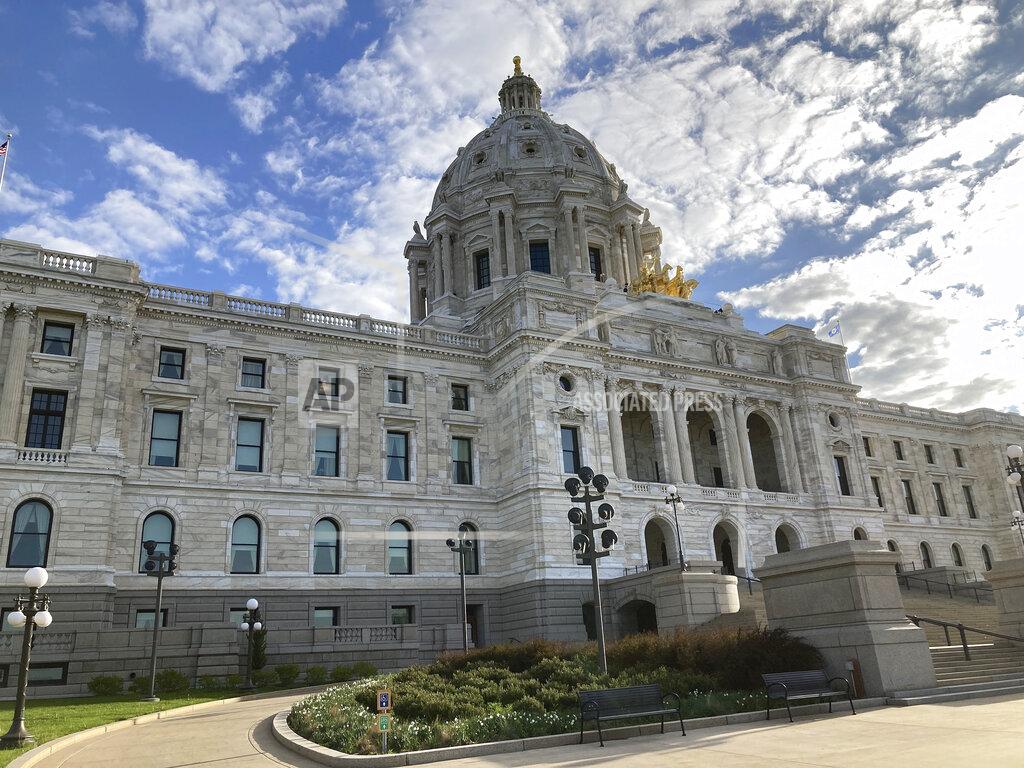 Steve Karnowski Clouds float over the Minnesota State Capitol in St. Paul, Minnesota, on Monday, May 23, 2022, hours after the divided Minnesota Legislature blew a deadline for passing a package of tax cuts and new spending using the state's massive budget surplus, leaving the next steps uncertain for lawmakers and Democratic Gov. Tim Walz. (AP Photo/Steve Karnowski)