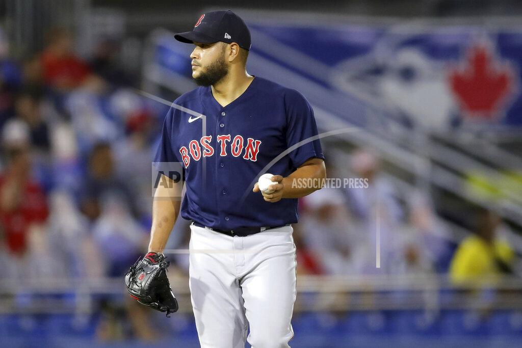 Mike Carlson Boston Red Sox starting pitcher Eduardo Rodriguez reacts after giving up a run to the Toronto Blue Jays on a double by Bo Bichette during the fourth inning of a baseball game Tuesday, May 18, 2021, in Dunedin, Fla. (AP Photo/Mike Carlson)