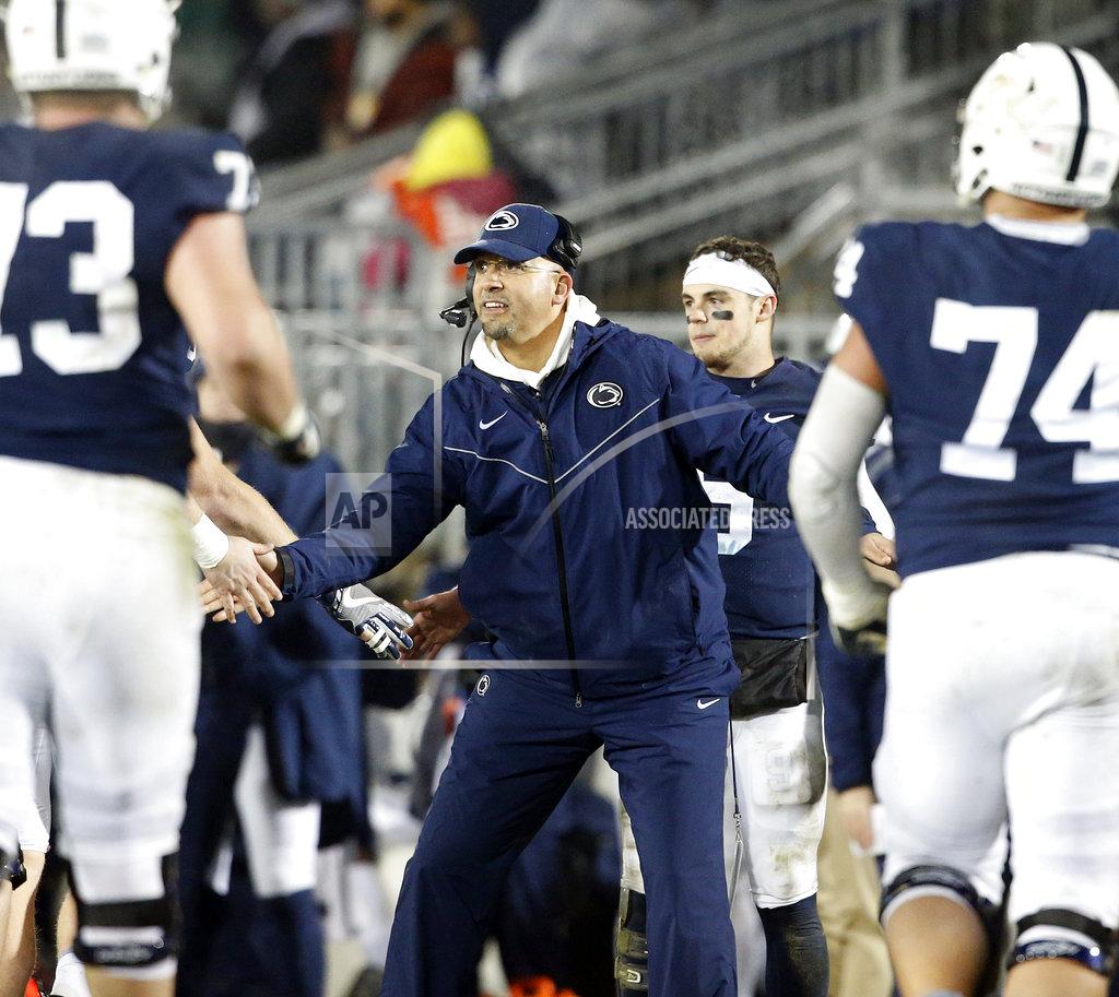 Chris Knight Penn State head coach James Franklin, congratulates his players after a touchdown against Maryland during the second half of an NCAA college football game in State College, Pa., Saturday, Nov. 24, 2018. Penn State won 38-3. (AP Photo/Chris Knight)