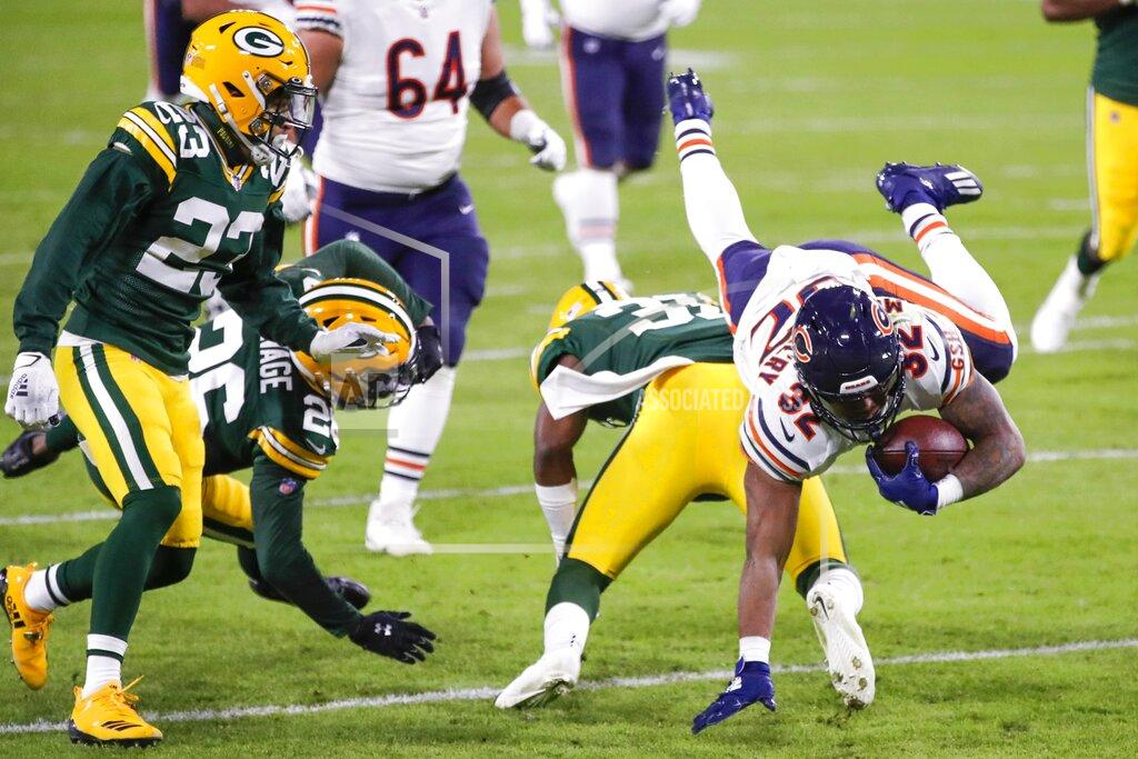 Matt Ludtke Chicago Bears' David Montgomery is stopped during the first half of an NFL football game against the Green Bay Packers Sunday, Nov. 29, 2020, in Green Bay, Wis. (AP Photo/Matt Ludtke)